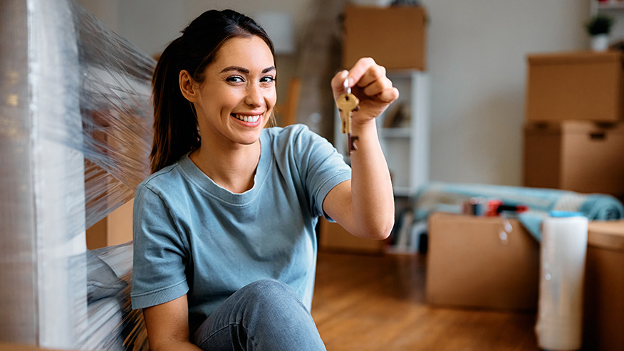 woman with keys to her new home