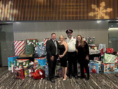 SAFE employees pose for donation photo