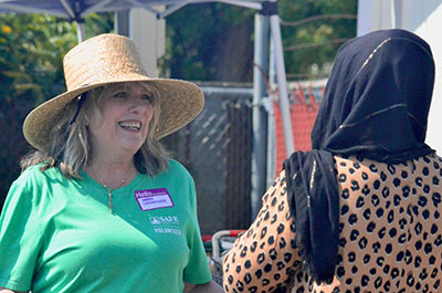 SAFE CU Relationship Officer Karen Shahhosseini greets a guest at the Rancho Cordova Food Locker.