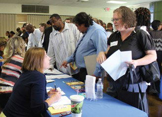 Veterans attend Volunteers of America Veteran Employment Services fair.