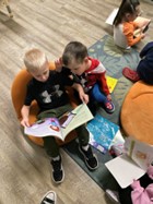 Students read at Single Mom Strong's Citrus Heights childcare center.