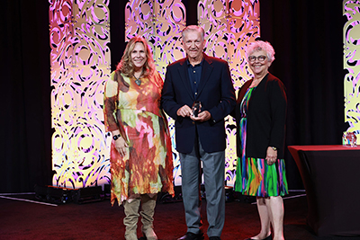 SAFE Board Chair Terrance Tremelling receiving award