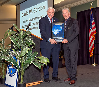 Sacramento County Office of Education Superintendent David W. Gordon and SAFE Credit Union Board Chair Terry Tremelling.